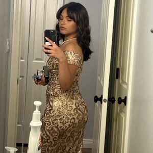 Elegant Gold Sequin Off-Shoulder Dress with 1 leg slit. Was only worn once.